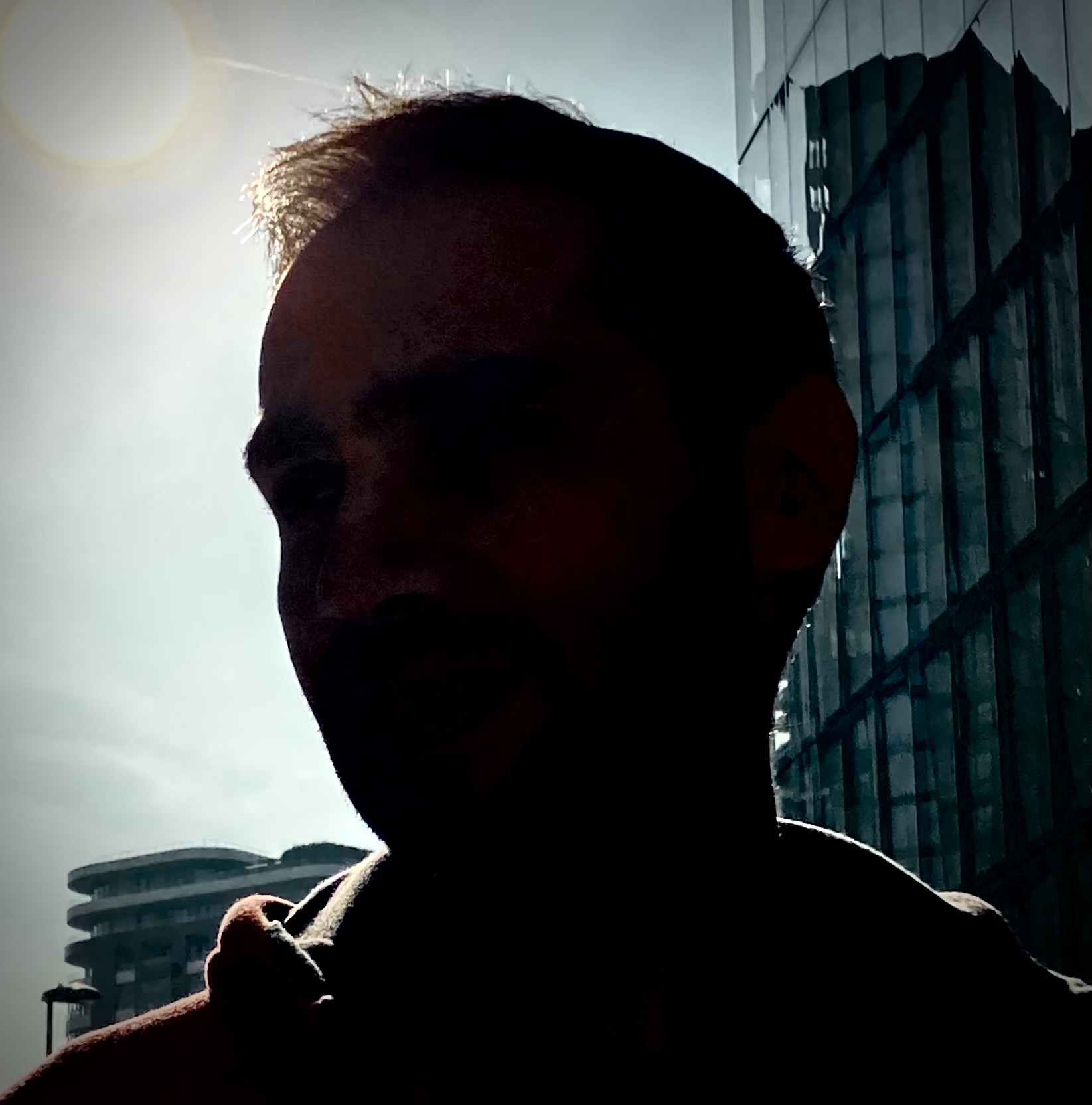 Majod Parsa, a man's head in dark shadow